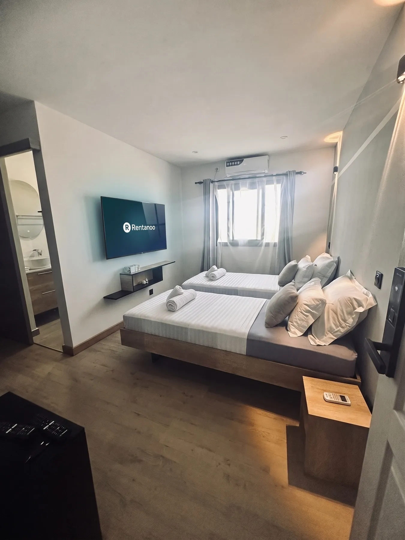 AM Résidence — chambre simple avec TV